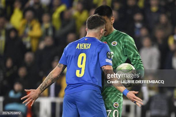 Union's Dennis Eckert Ayensa and Fenerbahce's goalkeeper Irfan Can Egribayat react during a soccer game between Turkish club Fenerbahce SK and...