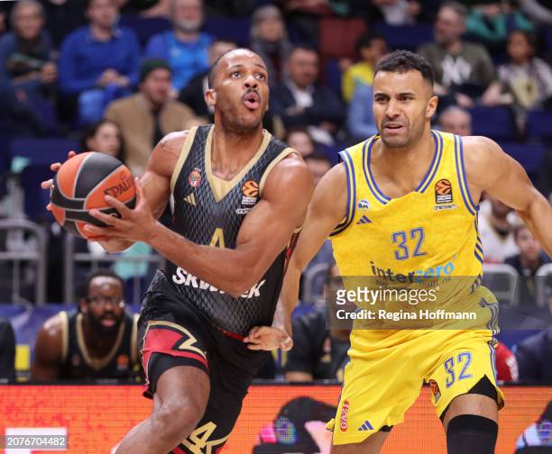 Jaron Blossomgame, #4 of AS Monaco competes with Johannes Thiemann, #32 of Alba Berlin during the Turkish Airlines EuroLeague Regular Season Round 29...