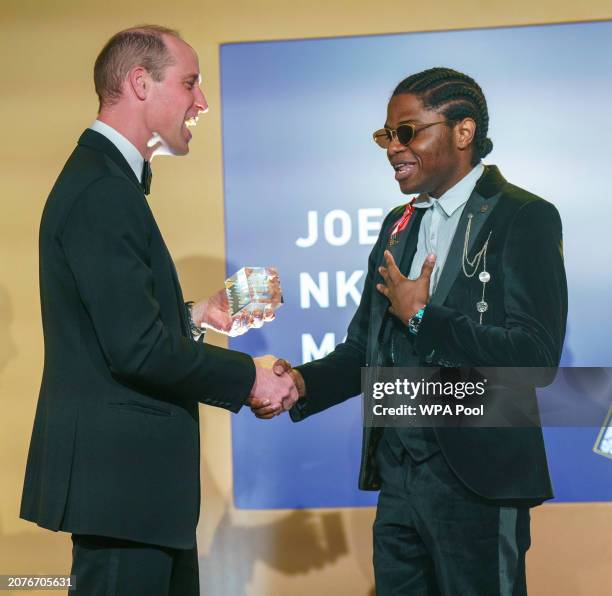 Prince William, Prince of Wales meets Joel Nkeonye Mordi from Nigeria as he attends The Diana Legacy Awards at the Science Museum on March 14, 2024...