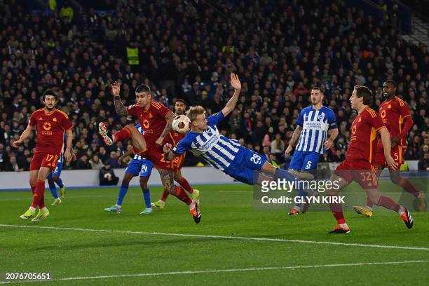 Brighton's Dutch defender Jan Paul van Hecke fails to score during the UEFA Europa League round of 16 second leg football match between Brighton and...