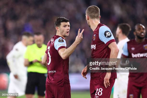 Aaron Cresswell of West Ham organises a defensive wall during the UEFA Europa League 2023/24 round of 16 second leg match between West Ham United FC...