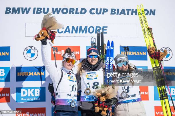 Second placed Lou Jeanmonnot of France, first placed Lisa Vittozzi of Italy and third placed Lena Haecki-Gross of Switzerland celebrates during the...
