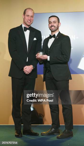 Prince William, Prince of Wales meets Yusuf Ben-Tarifite from England as he attends The Diana Legacy Awards at the Science Museum on March 14, 2024...