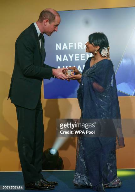 Prince William, Prince of Wales meets Nafira Nayeem Ahmad from Bangladesh as he attends The Diana Legacy Awards at the Science Museum on March 14,...