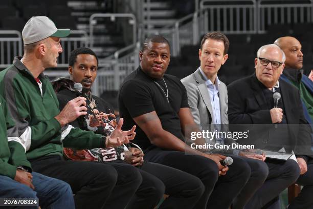 Former Milwaukee Bucks Steve Novak, Brandon Jennings, Desmond Mason, and Fred Roberts look on during Bucks Legends Night on January 28, 2024 at...