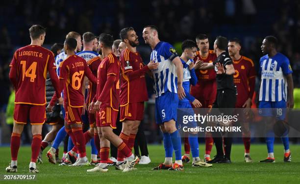 Brighton's English defender Lewis Dunk reacts after the UEFA Europa League round of 16 second leg football match between Brighton and Roma at the...