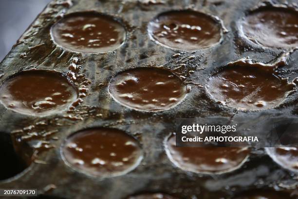 Detail of molds with cold 'panela' candy in a grinding oven during the raw cane sugar festival in the municipality of San Lorenzo on March 14, 2024...