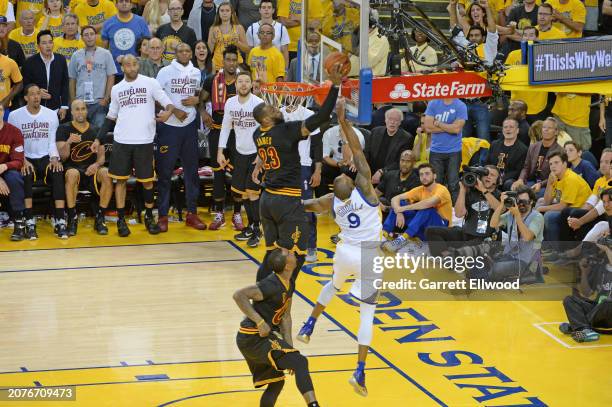 LeBron James of the Cleveland Cavaliers blocks a shot by Andre Iguodala of the Golden State Warriors during the 2016 NBA Finals Game Seven on June...