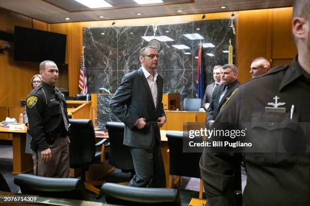 James Crumbley, the father of Oxford High School school shooter Ethan Crumbley, is led out of the courtroom after a jury found him guilty on all four...
