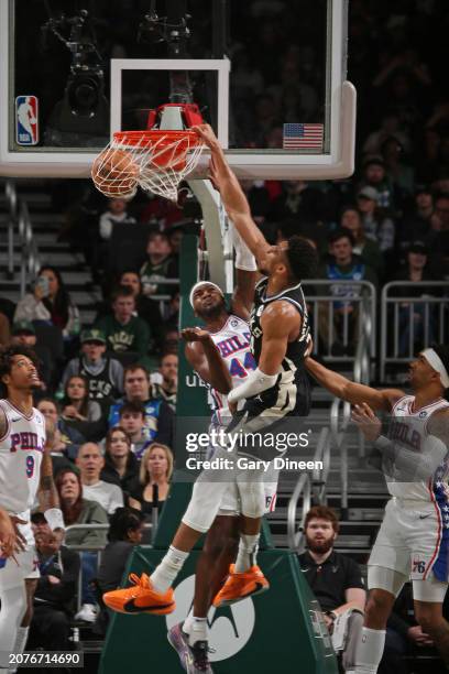 Giannis Antetokounmpo of the Milwaukee Bucks dunks the ball during the game against the Philadelphia 76ers on March 14, 2024 at the Fiserv Forum...