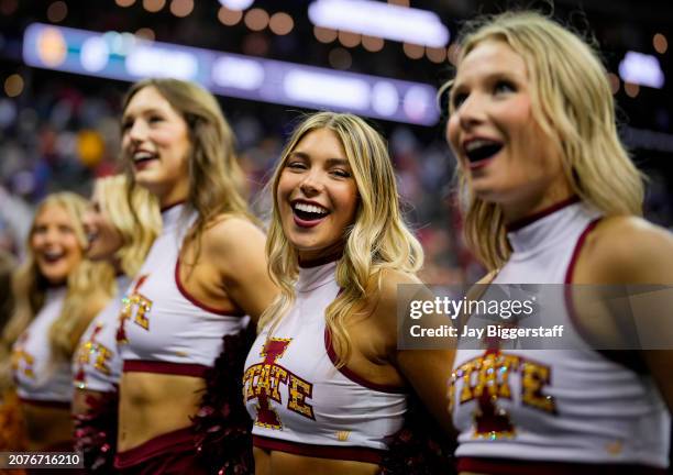 Iowa State Cyclones cheerleaders celebrate after defeating the Kansas State Wildcats in a quarterfinal game of the Big 12 Men's Basketball Tournament...