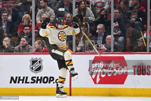 Jake DeBrusk of the Boston Bruins celebrates his overtime goal against the Montreal Canadiens at the Bell Centre on March 14, 2024 in Montreal,...