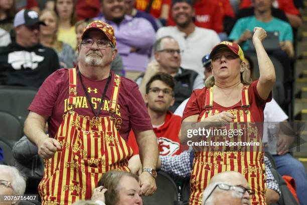 Iowa State Cyclones fans celebrate as their team pulls away in the second half of a Big 12 tournament quarterfinal game between the Kansas State...