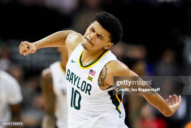 RayJ Dennis of the Baylor Bears celebrates after scoring during the second half of a quarterfinal game of the Big 12 Men's Basketball Tournament...