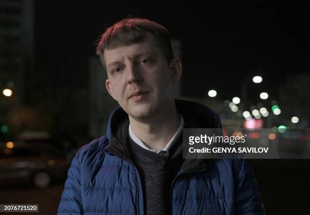 Artem, 31-year-old member of the IT Army of Ukraine group of volunteer hackers poses in Kyiv on February 26 amid the Russian invasion of Ukraine. The...