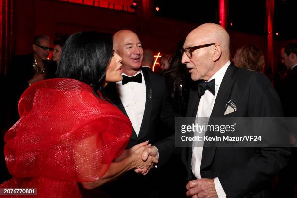 Lauren Sánchez, Jeff Bezos, Patrick Stewart attend the 2024 Vanity Fair Oscar Party Hosted By Radhika Jones at Wallis Annenberg Center for the...