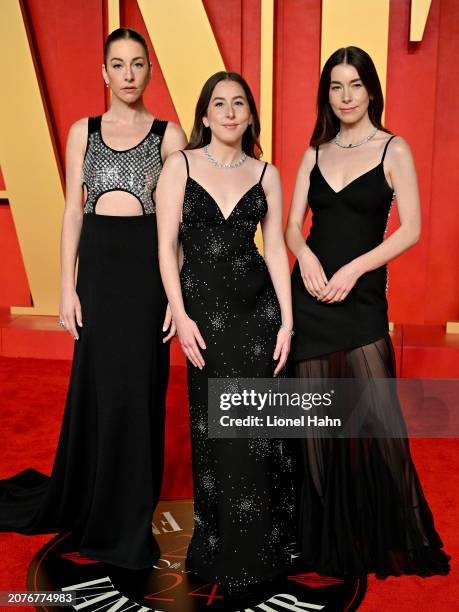 Este Haim, Alana Haim, and Danielle Haim attend the 2024 Vanity Fair Oscar Party Hosted By Radhika Jones at Wallis Annenberg Center for the...