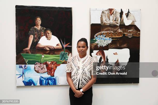 La Prairie Art Award winner Marikit Santiago poses in front of her winning works ' A seat at the Table ' and 'A seat at the Table at Art Gallery Of...