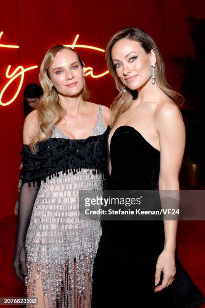 Diane Kruger and Olivia Wilde attend the 2024 Vanity Fair Oscar Party Hosted By Radhika Jones at Wallis Annenberg Center for the Performing Arts on...