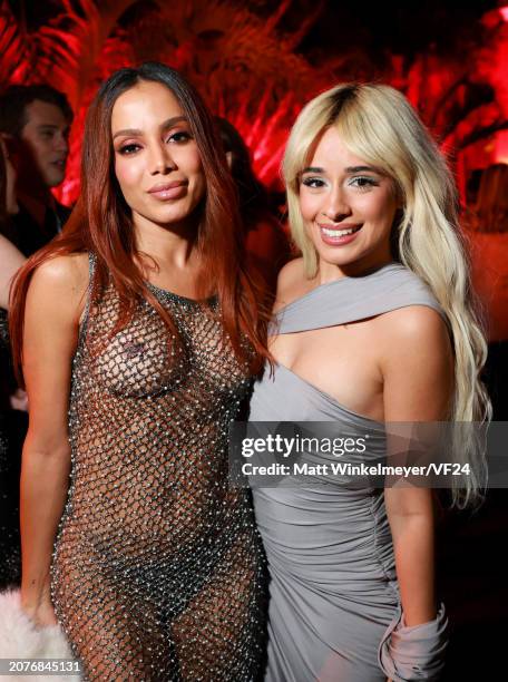 Anitta and Camila Cabello attend the 2024 Vanity Fair Oscar Party Hosted By Radhika Jones at Wallis Annenberg Center for the Performing Arts on March...