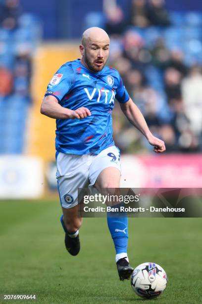 Paddy Madden of Stockport County runs with the ball during the Sky Bet League Two match between Stockport County and Newport County at Edgeley Park...