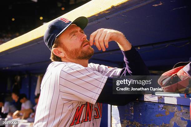 Bert Blyleven of the Minnesota Twins stands in the dugout during a game in the 1989 season.