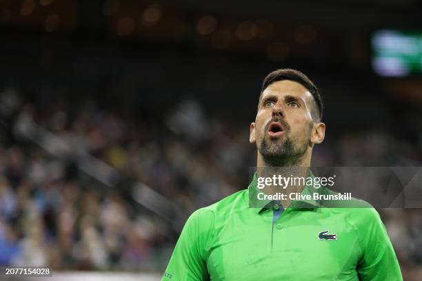 Novak Djokovic of Serbia shows his dejection during his three set defeat against Luca Nardi of Italy in their third round match during the BNP...