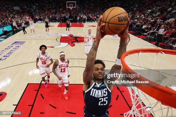 Washington of the Dallas Mavericks dunks the ball against the Chicago Bulls at the United Center on March 11, 2024 in Chicago, Illinois. NOTE TO...