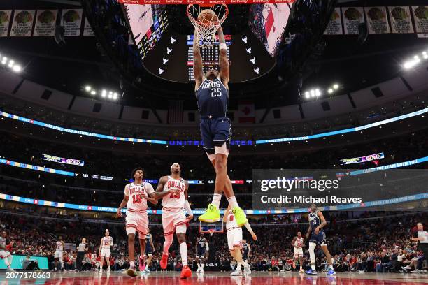 Washington of the Dallas Mavericks dunks the ball against the Chicago Bulls at the United Center on March 11, 2024 in Chicago, Illinois. NOTE TO...