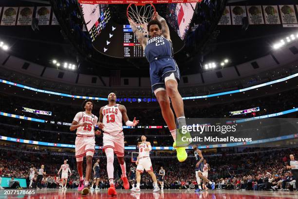 Washington of the Dallas Mavericks dunks the ball against the Chicago Bulls at the United Center on March 11, 2024 in Chicago, Illinois. NOTE TO...