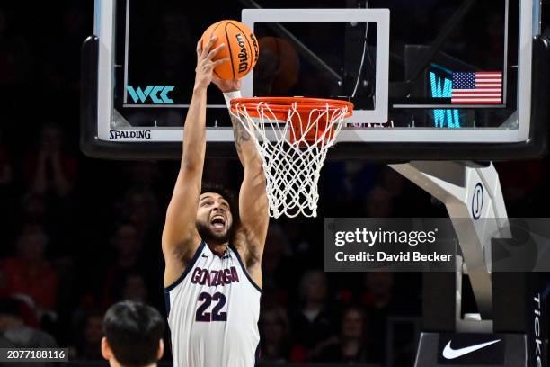 Anton Watson of the Gonzaga Bulldogs dunks the ball against the San Francisco Dons in the first half of a semifinal game of the West Coast Conference...