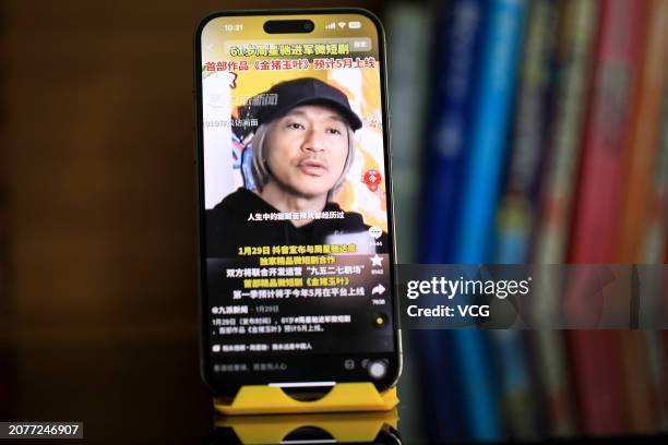 Citizen shows a screenshot of an online mini drama series on a mobile phone through the video-sharing platform Douyin, which is owned by Chinese tech...