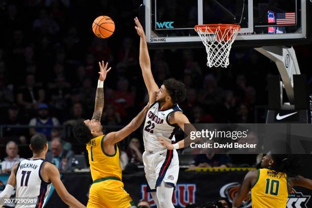 Anton Watson of the Gonzaga Bulldogs goes to block a shot by Malik Thomas of the San Francisco Dons in the second half of a semifinal game of the...