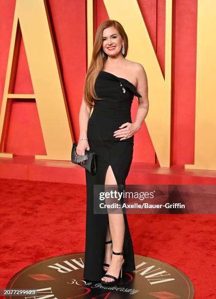 Isla Fisher attends the 2024 Vanity Fair Oscar Party hosted by Radhika Jones at Wallis Annenberg Center for the Performing Arts on March 10, 2024 in...