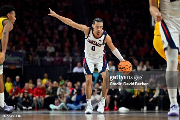 Ryan Nembhard of the Gonzaga Bulldogs calls a play as he brings the ball up court against the San Francisco Dons in the second half of a semifinal...