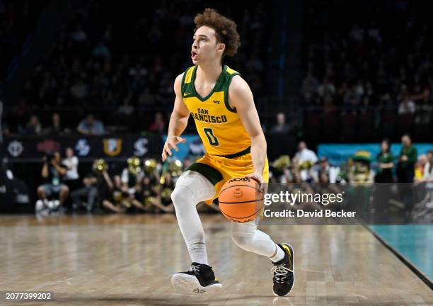 Ryan Beasley of the San Francisco Dons handles the ball in the first half of a semifinal game against the Gonzaga Bulldogs of the West Coast...