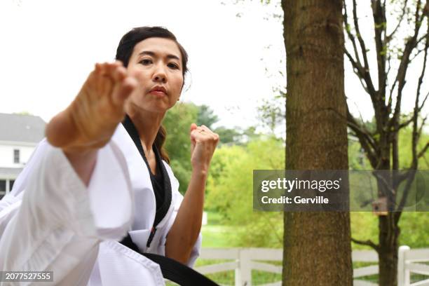 outdoor fight - black belt stock pictures, royalty-free photos & images