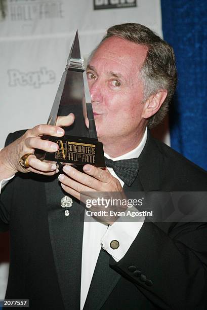 Singer/songwriter Neil Sedaka poses in the press room at the Annual Songwriters Hall of Fame Awards ceremony and dinner at the Marriott Marquis June...