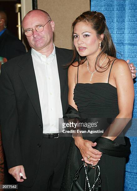 Inductee musician Phil Collins and his wife Oriana pose in the press room at the Annual Songwriters Hall of Fame Awards ceremony and dinner at the...