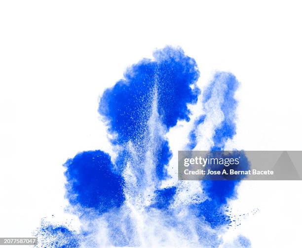 multiple explosions of blue smoke and dust in upward movement on a white background. - detonator stock pictures, royalty-free photos & images