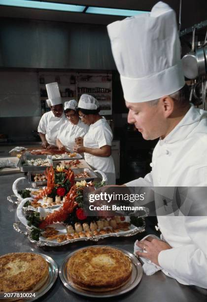 White House chef Henry Haller preparing food for the wedding reception of Lynda Bird Johnson, Washington, November 30th 1967.