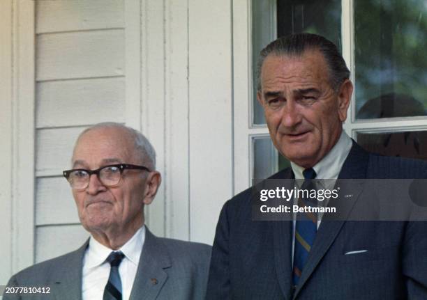 Former President Harry Truman and President Lyndon Johnson standing on the porch of the Truman home in Independence, Missouri, May 3rd 1967. Johnson...
