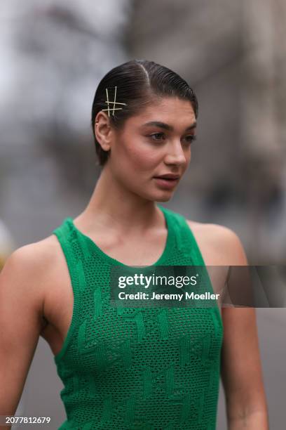 Sarah Posch seen wearing Karl Lagerfeld green long knit dress, on March 09, 2024 in Berlin, Germany.