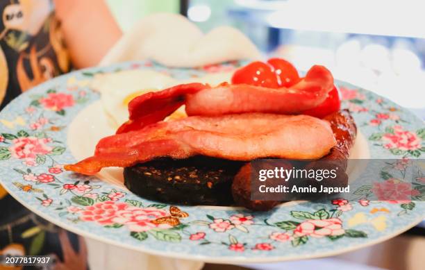 breakfast plate with sausages, bacon and eggs - galway people stock pictures, royalty-free photos & images