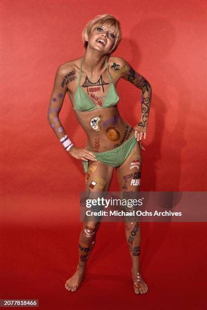 American actress Goldie Hawn wears body paint and a bikini in a promotional portrait for the television series, 'Laugh-In', US, 30th June 1968.