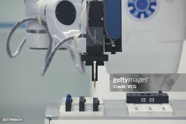 Microfluidic liquid handling robot of Single-cell Proteome Analysis Platform works at a laboratory of Zhejiang University's Hangzhou Global...
