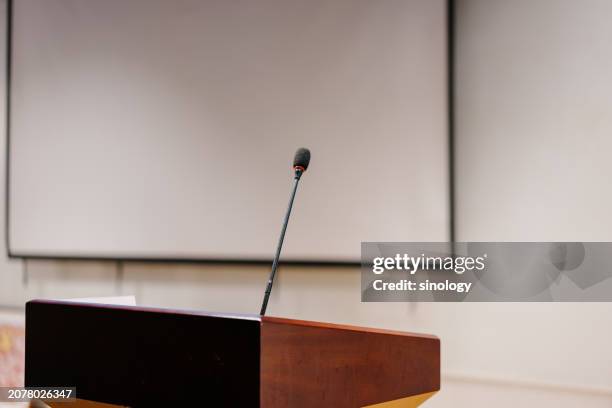 microphone on podium - talarstol bildbanksfoton och bilder