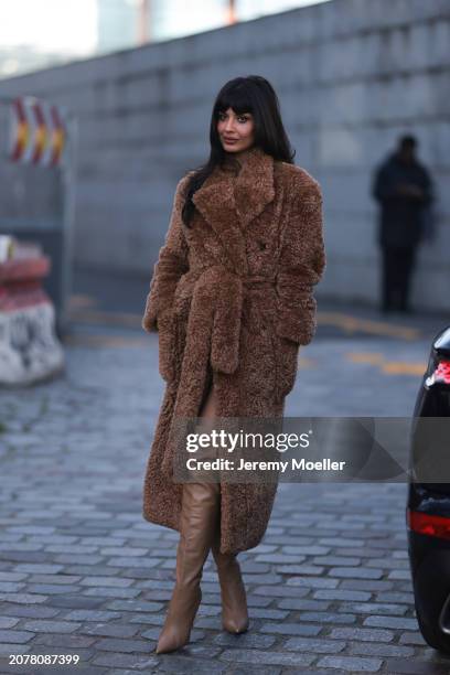 Jameela Jamil seen wearing a brown long teddy coat, beige over the knees boots, outside Stella McCartney show, during the Womenswear Fall/Winter...