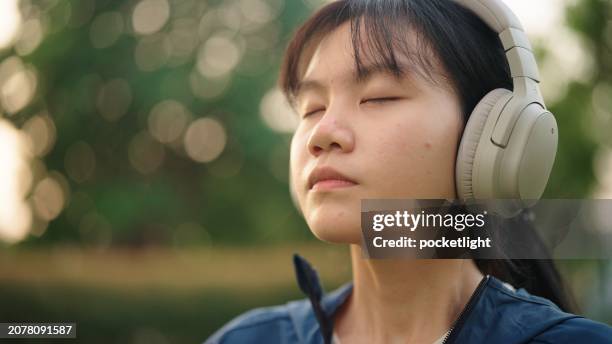 breathing inhaling at nature. - girl with hand on chest stock pictures, royalty-free photos & images