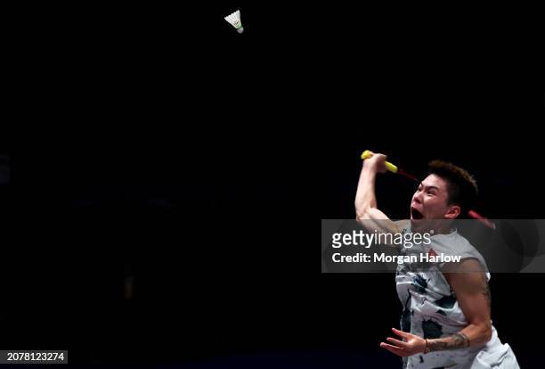 Lee Cheuk Yiu of Hong Kong in action against Christo Popov of France in the Men's Singles on Day One of the Yonex All England Open Badminton...